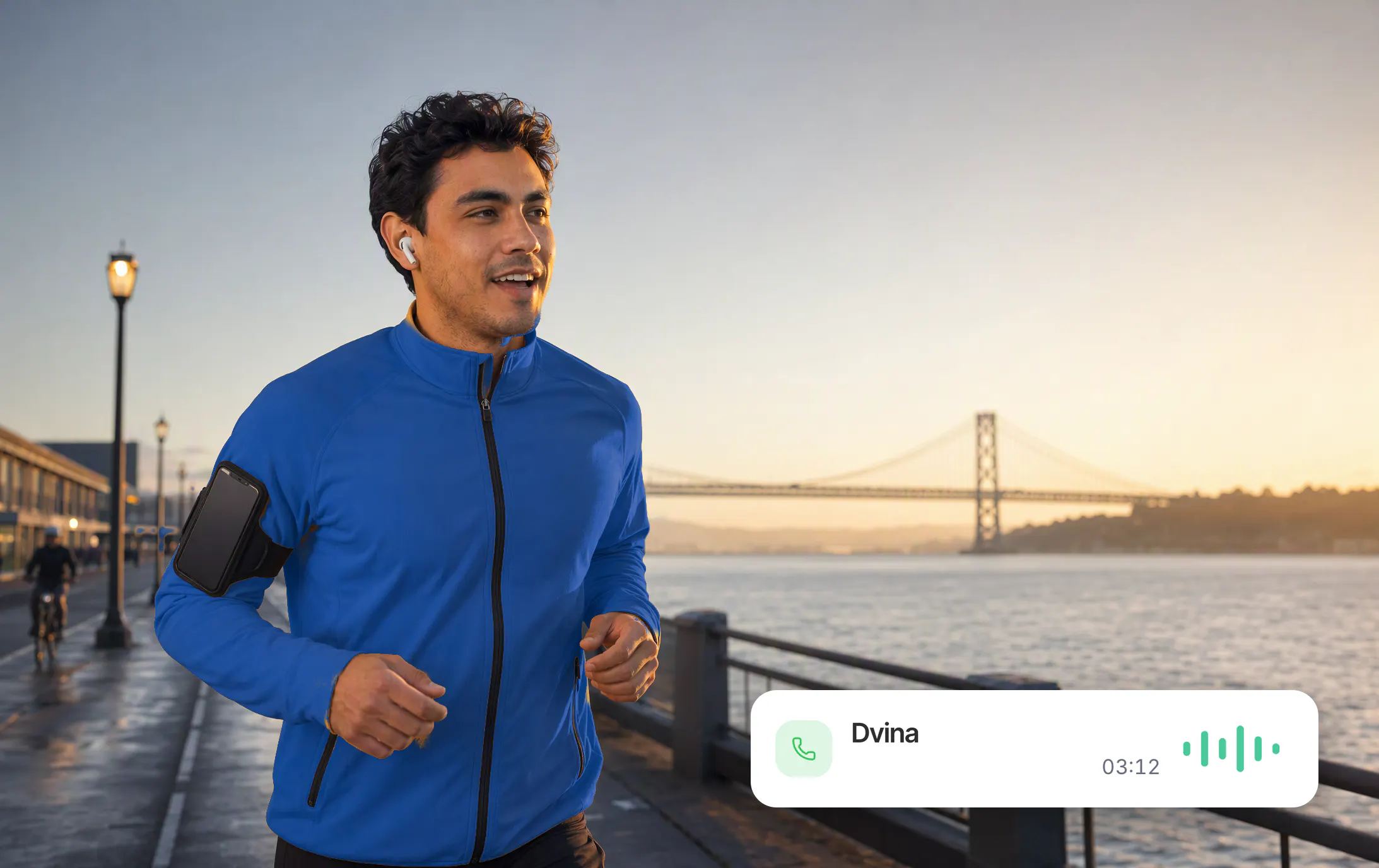 A young man laughs mid-stride on his dawn run along the Embarcadero, the Bay Bridge behind him, on a call with Dvina three minutes in.