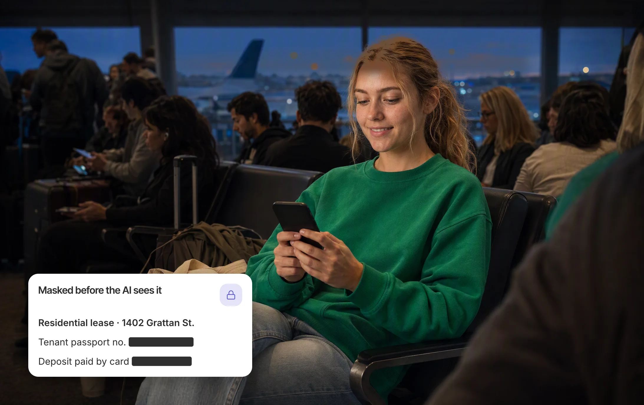 At a packed airport gate at dusk, strangers close on every side, a young blonde woman in a green sweatshirt sends a document from her phone, its personal details masked before the AI sees it.