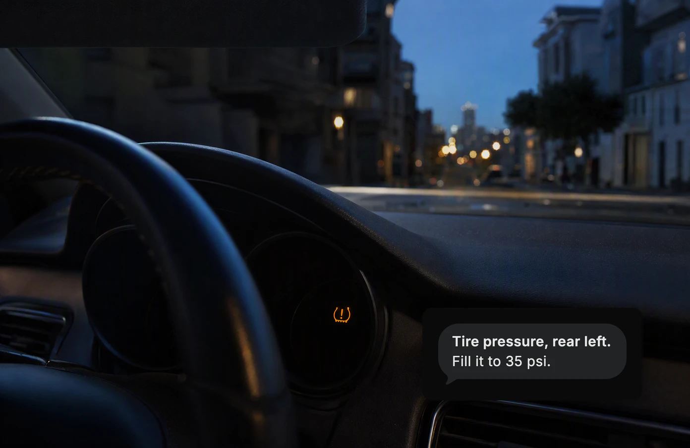 A car's dashboard at dusk with one amber warning light. Dvina answers the photo: Tire pressure, rear left. Fill it to 35 psi.