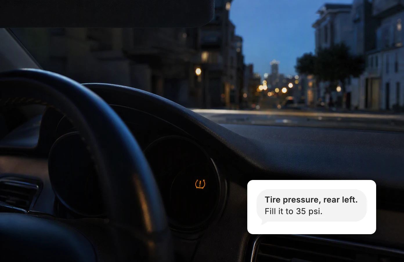 A car's dashboard at dusk with one amber warning light. Dvina answers the photo: Tire pressure, rear left. Fill it to 35 psi.