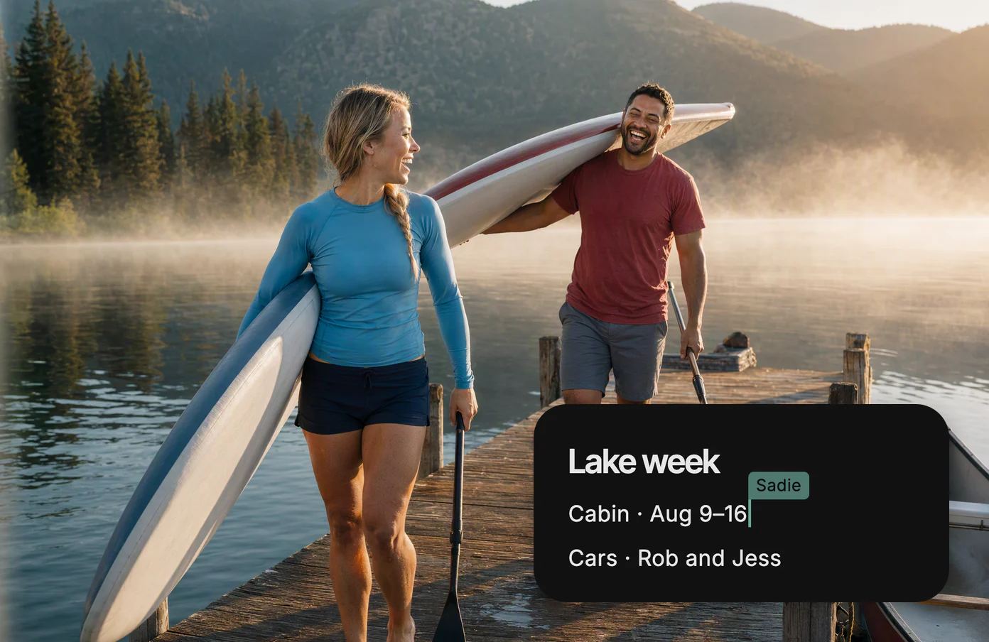 Sadie and Rob carry paddleboards down a dock at dawn, with the shared page Lake week, Sadie editing.